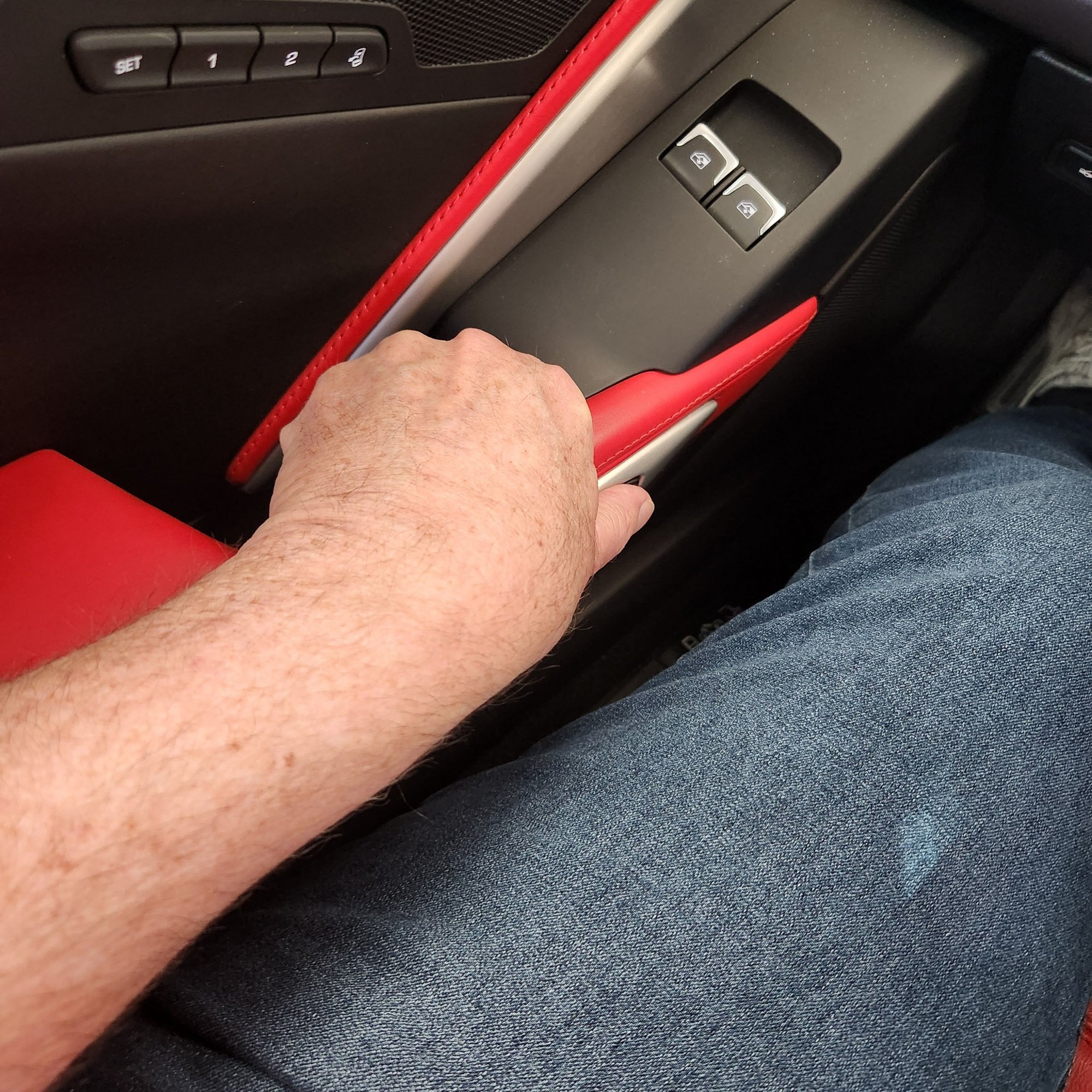 Wrist crammed up to get thumb to button. Fingers crammed up. 