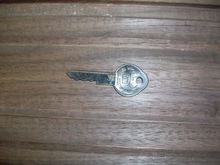 GM stamp and no key code. I have never seen one cut like this.