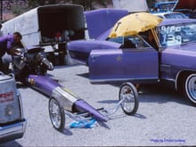 Eddie's 1966 top fuel car with matching Eddie Hill Purple Pontiac tow car