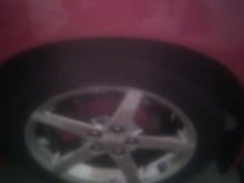 Chrome wheel with red caliper