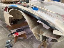 we had cut the front of the fender so we have to splice in this piece. put in horizontal bonding strip. fender on this side was cut at the 1 1/2" tape line