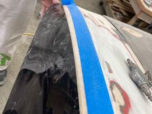 had to cut lower on the fender than the other side where we cut on the tape line