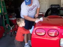Teach them young to help wax the car...