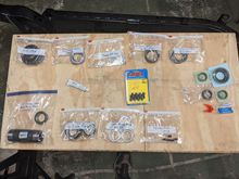 (Top)Posi Shims, Carrier Shims, Pinion Shims
(Mid) GM pattern paste, 8 ARP Ring Gear Bolts, 3 Diff Seals
(Bottom) Pinion Lower Bearing Press Tool, Slip-Fit used Set-up Pinion Bearings, Slip-Fit carrier bearing shells for set-up, Ring Gear install screw-in studs