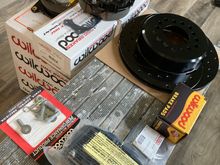 I like the black rotors, zinc rotors were bought in 2005 and rusting in the box from previous owner of car