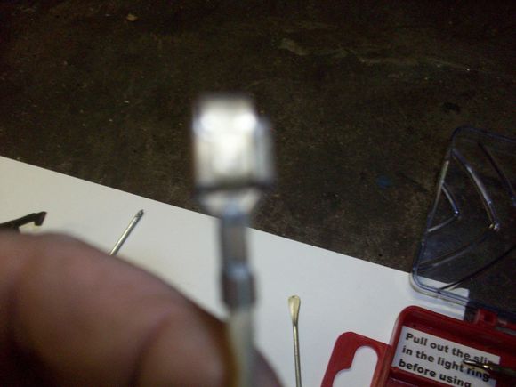 Bad picture, but the contact is a piece of brass bent almost 180 degrees and needs to be spread out to assure a good connection.