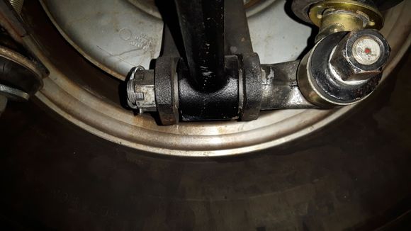 In all these pictures the frame sitting on blocks and the wheels are hanging.