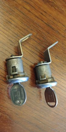 Matched door key set. One still has knockout. 