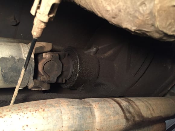 im guessing this is some kind of bushing or seal that is leaking from the rear diff.