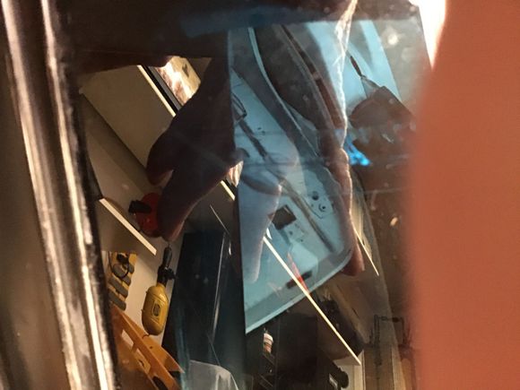 Wite in windshield taped over aftermarket 