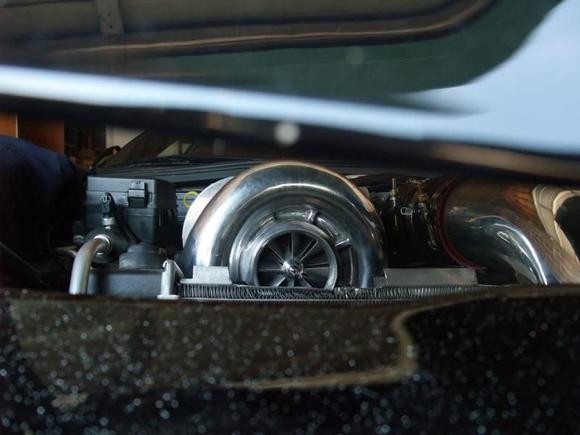 The Vortech Blower peeking from behind the radiator..