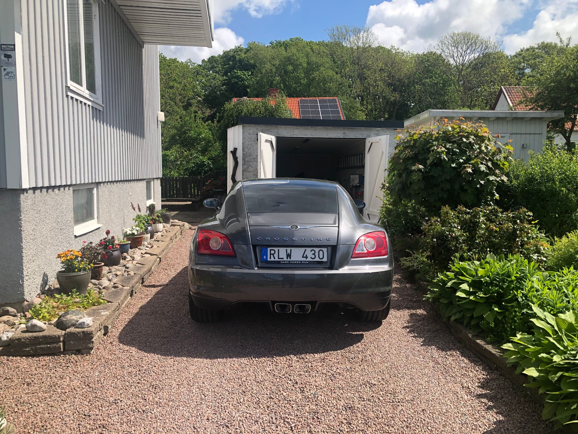 Not a lot of room in and out of the garage!