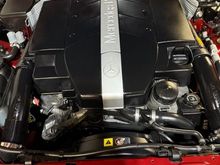 Larger airbox.  The trim piece towards the front is considered a separate part and has to be ordered that way since I could not find a used airbox that included the trim.