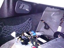 Passenger footwell panel removed (amplifier is on bottom right of photo)