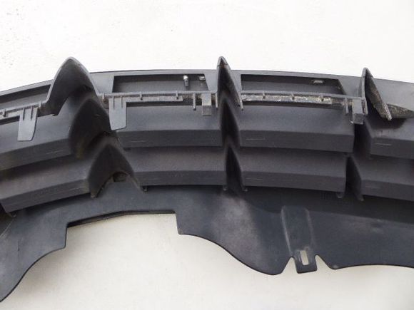 under side of grille showing NO broken tabs