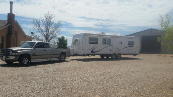 98.5 Ram with our new (to us) 2001 CrossRoads All American 32-ft travel trailer.
