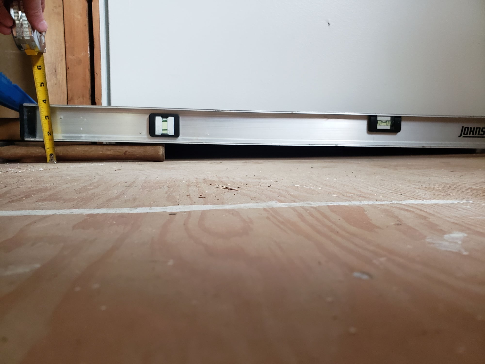 Steep Slope In Floor Around Exterior, Installing Laminate Flooring On Sloped Floor