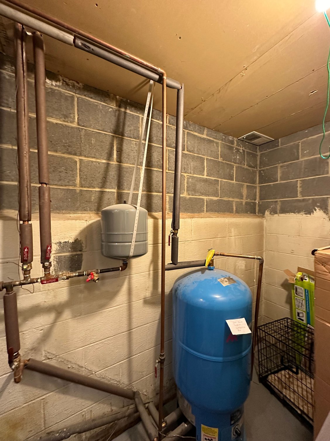 How can I flush my baseboard heating system