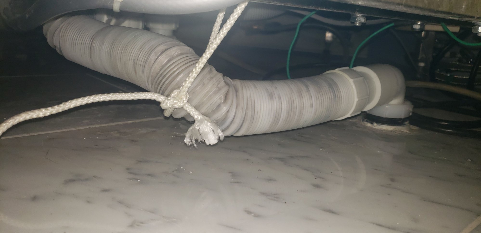 Steam Shower with Flexible Drain Pipe not Draining Properly