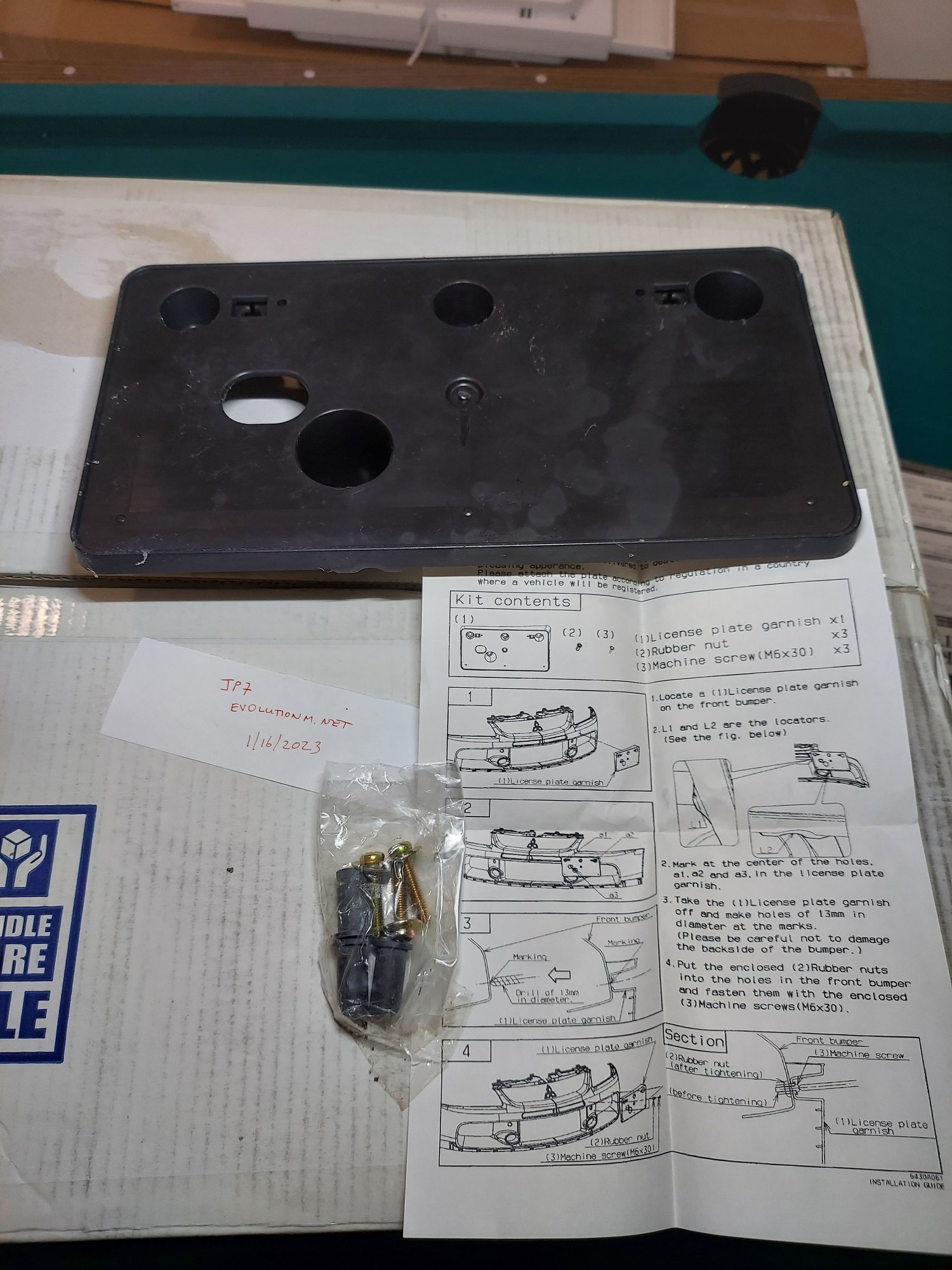 Exterior Body Parts - Evo 9 front liscense plate bracket with hardware (brand new) part number 6430A057 - New - 2006 to 2007 Mitsubishi Lancer Evolution - South Chicago Suburbs, IL 60475, United States