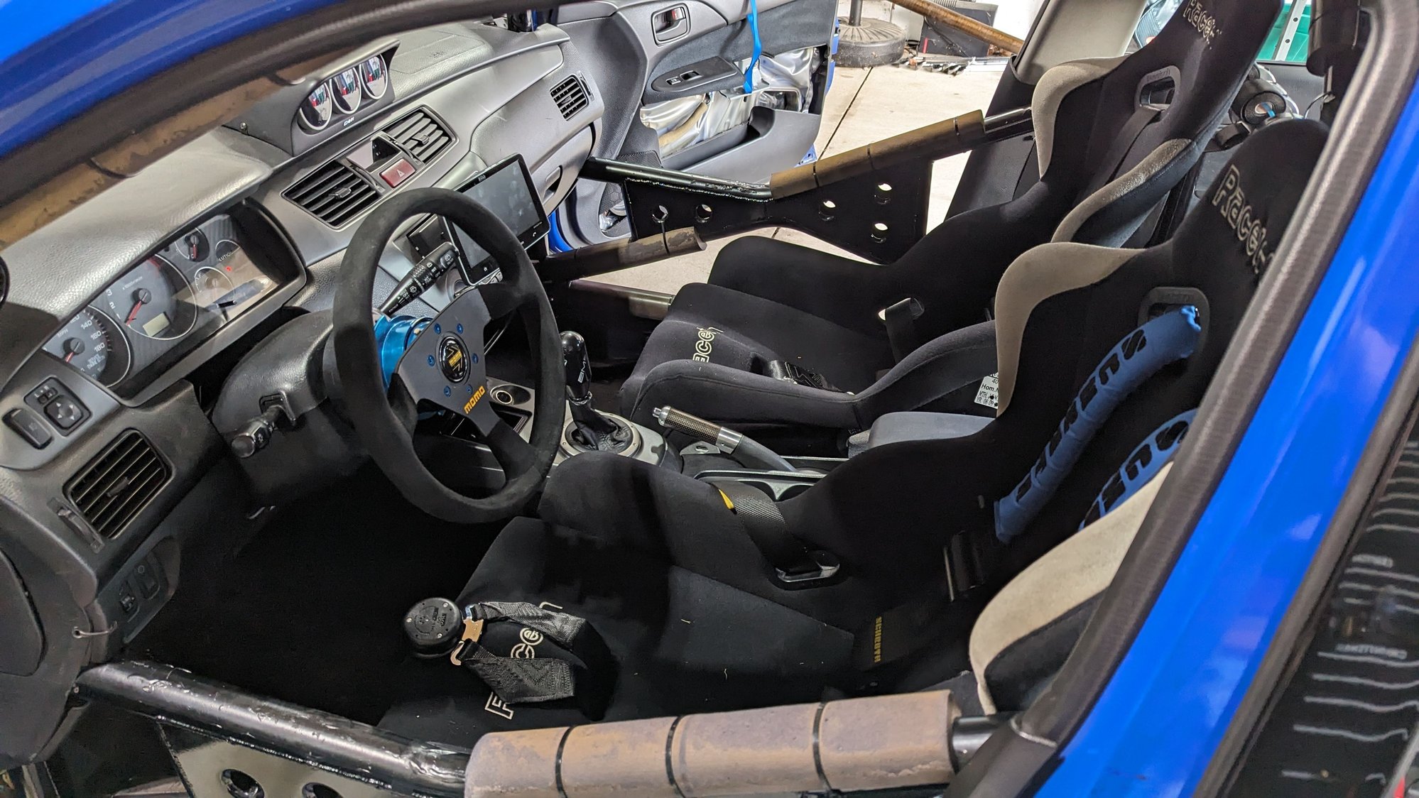 2003 Mitsubishi Lancer Evolution - 2003 Caged BBY Evo 8 - Used - VIN JA3AH86F93U124075 - 89,000 Miles - 4 cyl - AWD - Manual - Sedan - Blue - Commerce Township, MI 48382, United States