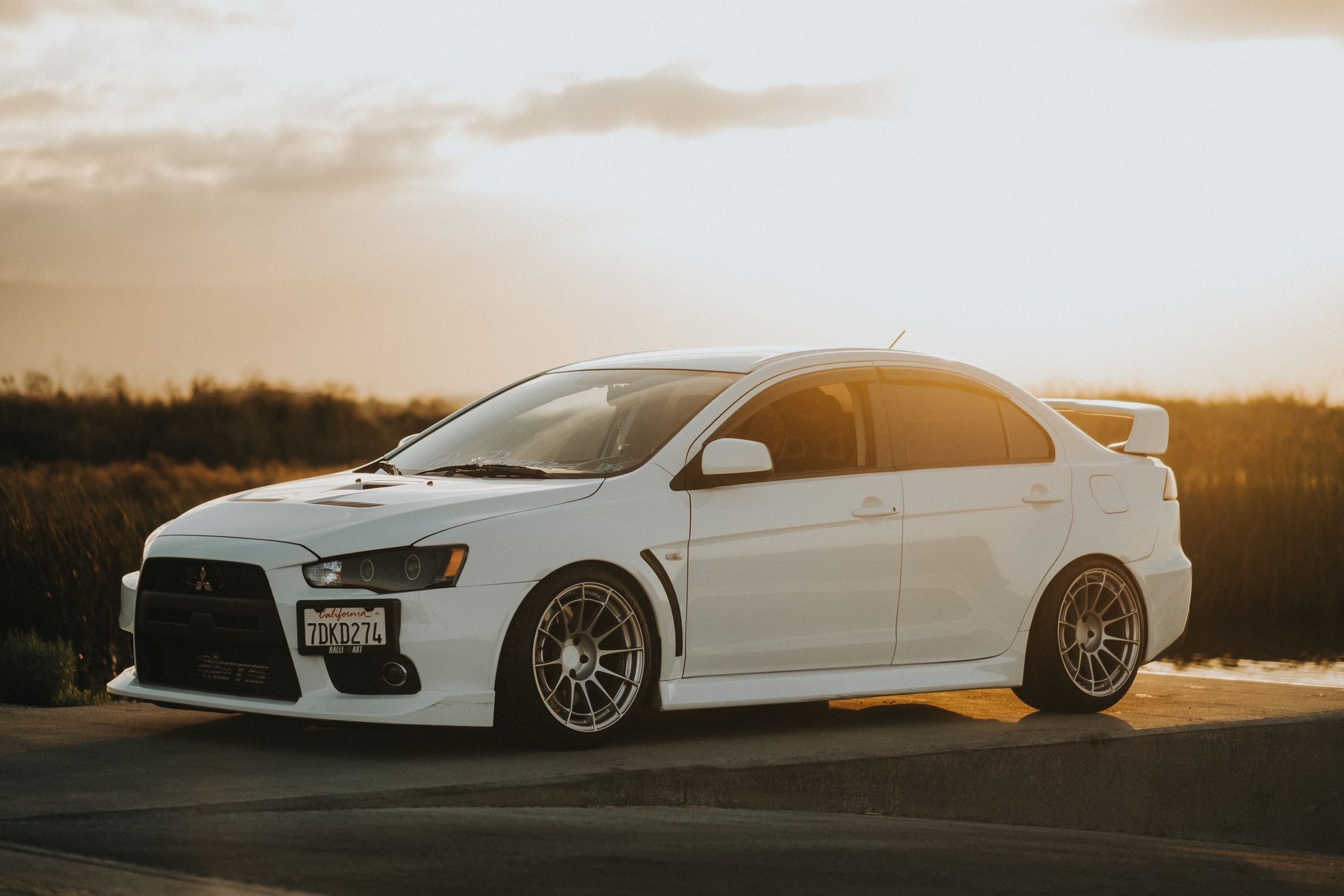 2014 Mitsubishi Lancer Evolution - 2014 Mitsubishi Lancer Evolution GSR - Used - VIN JA32W8FV1EU006770 - 49,700 Miles - 4 cyl - AWD - Manual - Sedan - White - San Jose, CA 95133, United States