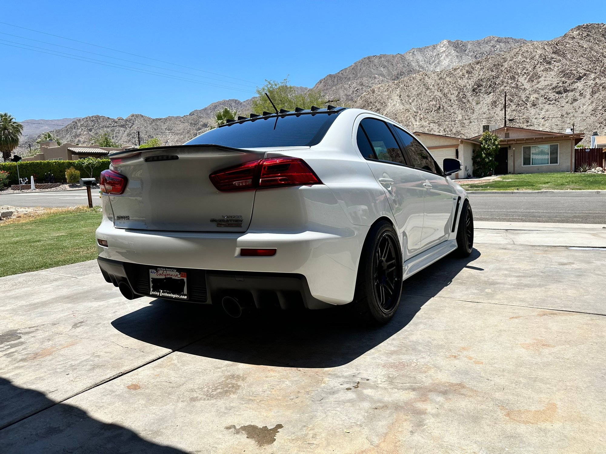 2015 Mitsubishi Lancer Evolution - 2015 Evo X FE - Used - VIN JA32W7FV5FU028282 - 13,813 Miles - AWD - Manual - Sedan - White - La Quinta, CA 92253, United States