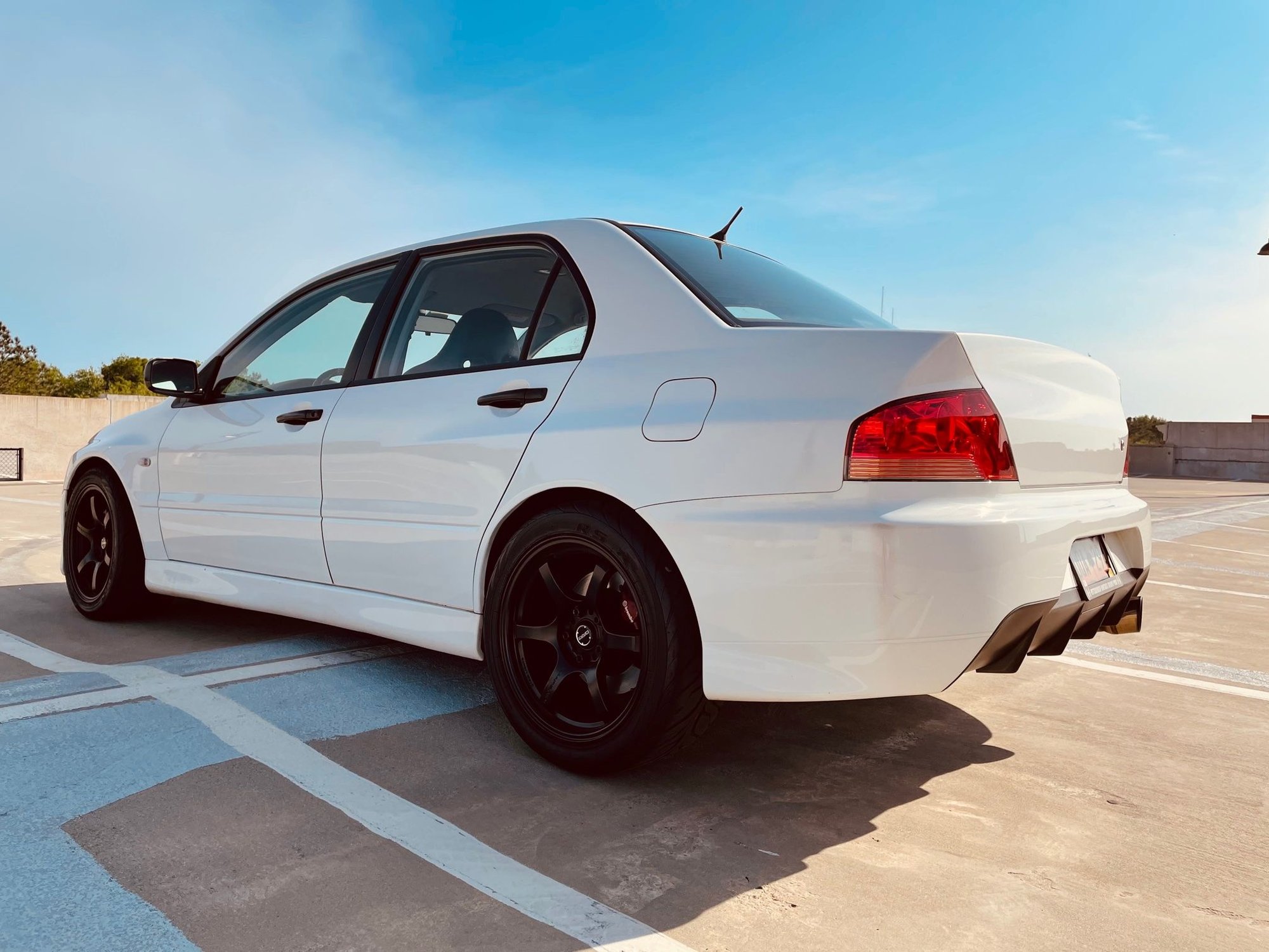 2006 Mitsubishi Lancer Evolution - 2006 Mitsubishi Lancer Evolution IX RS - Used - VIN JA3AH36C66U043788 - 141,600 Miles - 4 cyl - AWD - Manual - Sedan - White - Mount Pleasant, SC 29466, United States