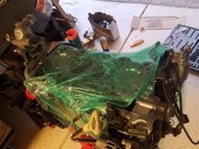 Finally, I installed the water pipe assembly, oil dip stick, and alternator before wrapping the block in shrink wrap and calling it a day.