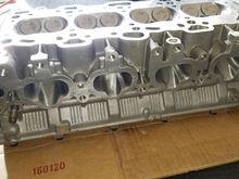 Intake side ported all the way to the valve bowls.