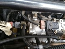 Boost sensor goes to right. Line wraps around and sensor is hiding behind for connector.
