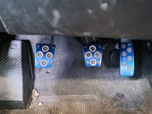 Please excuse the dirty carpet - it spent time at a shop when I'd usually be prepping it for winter storage. Pic shows the Mitsubishi blue race pedals.