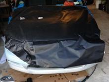 Vynl wrapping my hood.