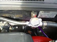 Water to air intecooler filler cap and bracket