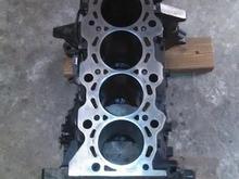 It still has the rebuilt engine smell