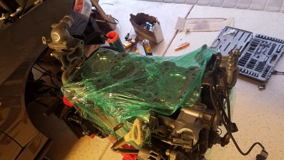 Finally, I installed the water pipe assembly, oil dip stick, and alternator before wrapping the block in shrink wrap and calling it a day.