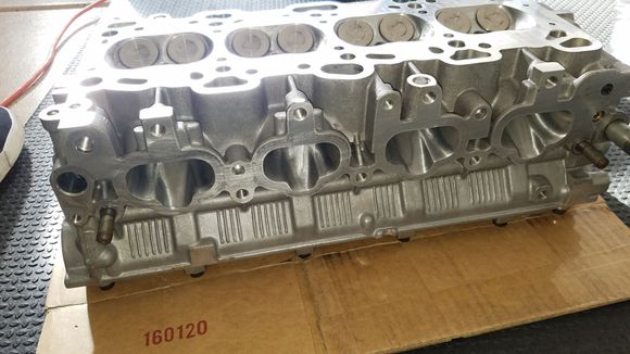 Intake side ported all the way to the valve bowls.