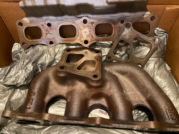 Stock manifold taken out. She has served for 103k miles.