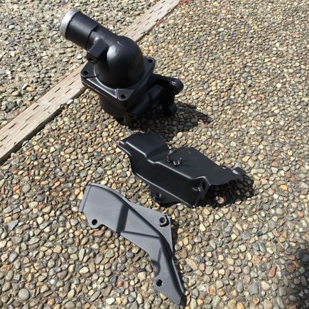 Tried powder coating out. Came out looking good. Thermostat housing and metal timing belt covers done here.