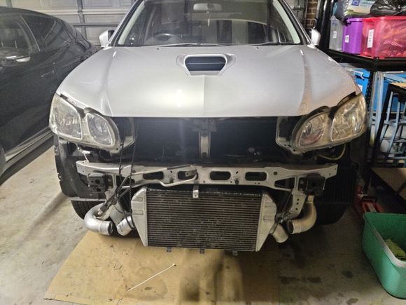 Mockup of stock front mount. Doesnt fit without cutting half of the bumper support bar away or hanging out the bottom of the bumper. didnt want that so went to an aftermarket IC core