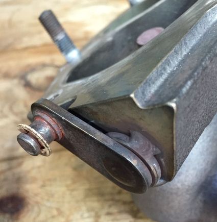 Wastegate shaft bushing welded to the housing.