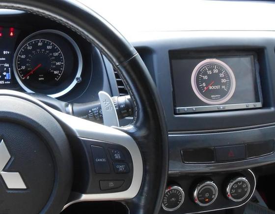 Using an ECU wireless dongle and DashCommand through Pioneer APPRADIO2 to display the boost ;)