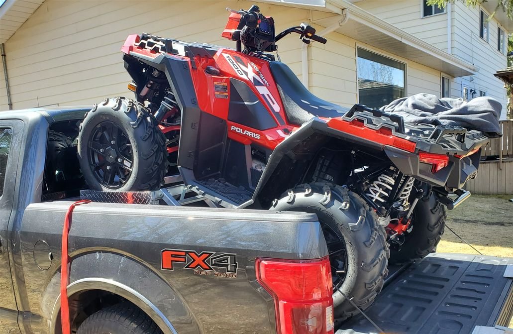 Atv truck box riser