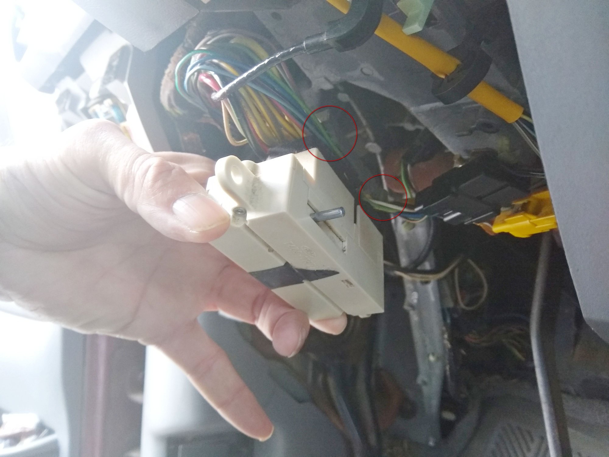 5. This barely shows the top connectors. Hard to photograph but I believe the same as the bottom, two connectors, forward and back, all broken off, Circled in red.