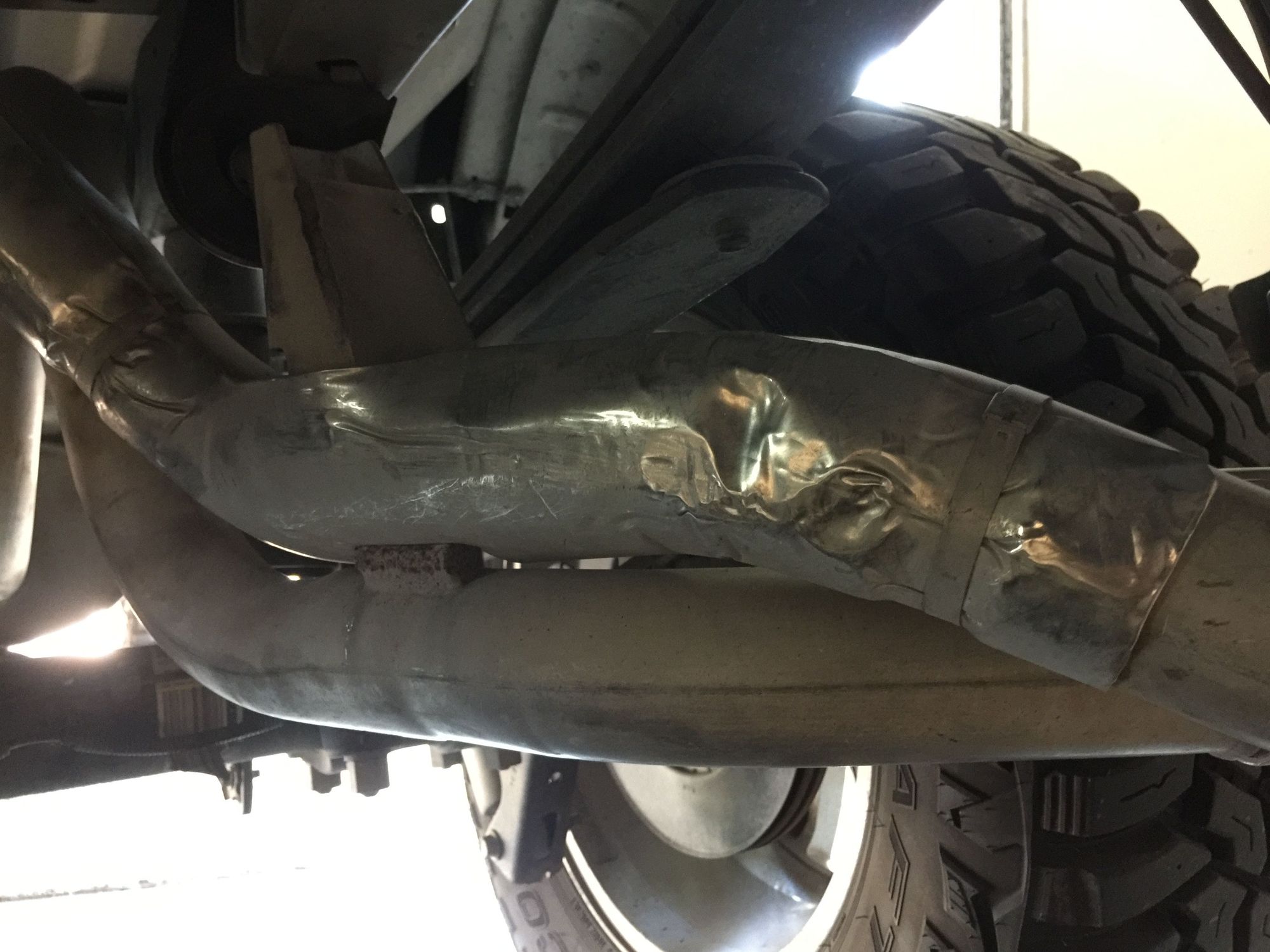 Fitting a 35/12.5 Spare in the Stock Location Ford F150 Forum
