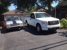 My new truck sitting beside the first truck I ever bought