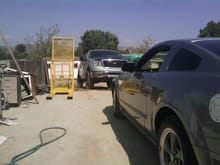 my truck and my buddys mustang before he wrecked it :( but it is soon to be complete with Saleen bodykit