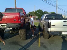 my buddys new f2...my truck looks tiny but i aint ashamed to park by a beast ford!!