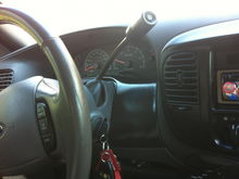 panel behind steering wheel black
