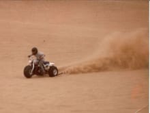 500cc twin - two stroke - ported, high rev pipes, 
the biggest carbs with jets drilled out even bigger to handle the methanol fuel
3.4 sec-- 66mph  Sand drags 100 yards
6 sec 100mph - open desert
Legs shake most runs   :-)  better than coffee in the morning